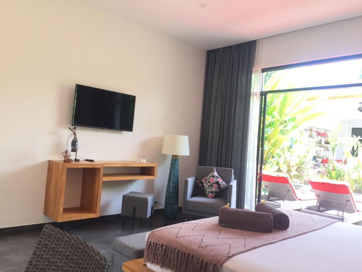 Le Chien Rouge Hotell Lovina Eksteriør bilde
