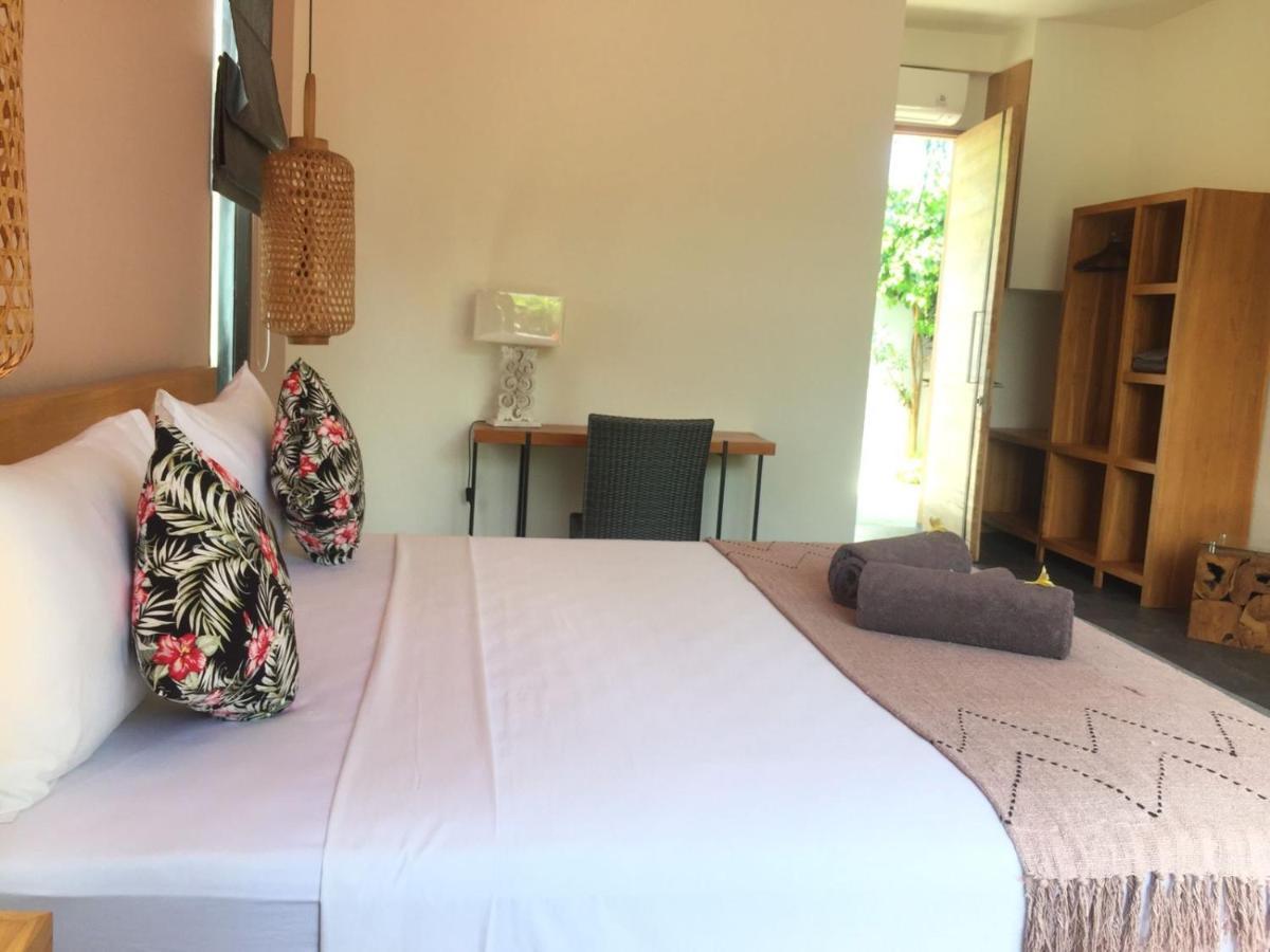 Le Chien Rouge Hotell Lovina Eksteriør bilde